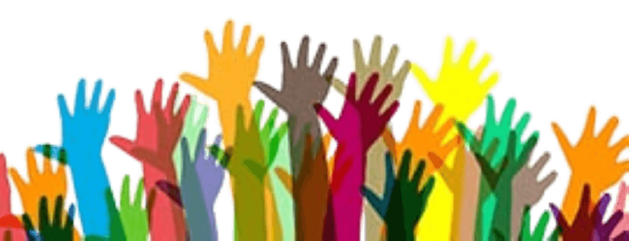 Many raised hands in bright colors